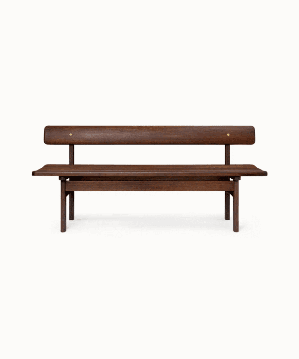 Solid wooden bench with sculpted backrest and brass details