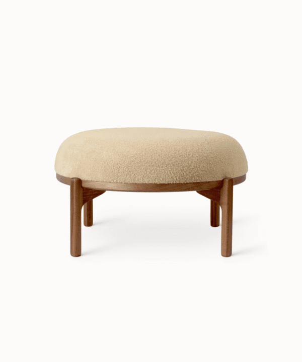 Bhramī wooden footstool with soft upholstery and oak base