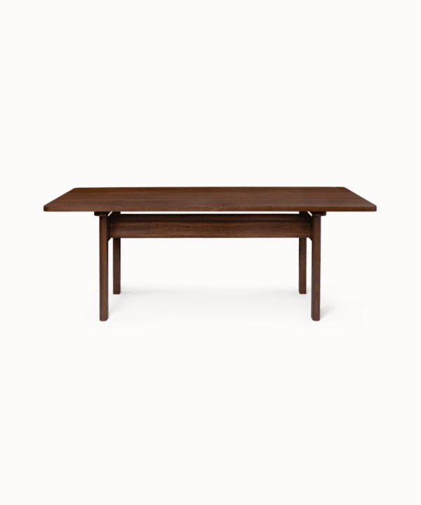 Nisarga-Bhojana solid eucalyptus wood dining table with dark-oiled finish and brushed brass details