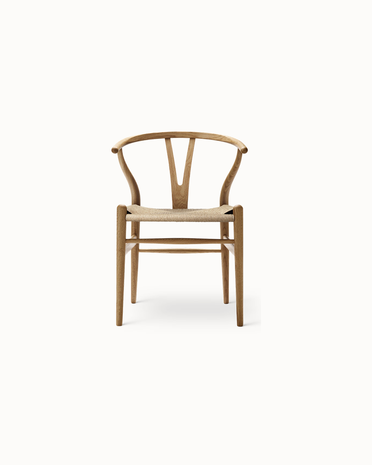 Handcrafted teak wood armchair with a curved backrest and natural finish.